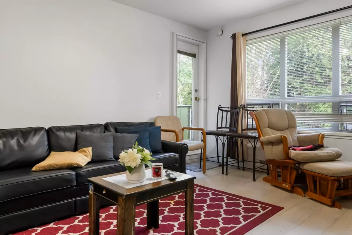 Living Room Photo of 310 14377 103 Avenue, Surrey, BC