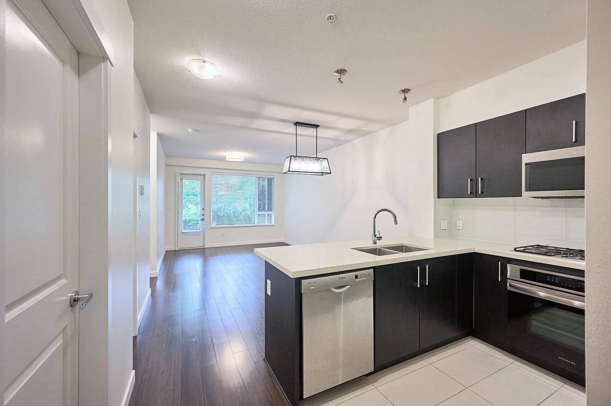Living Room Photo of 102 3163 Riverwalk Avenue, Vancouver, BC
