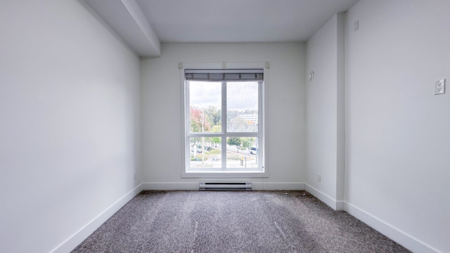 Bedroom 2 Photo of 304 13978 Fraser Highway, Surrey, BC