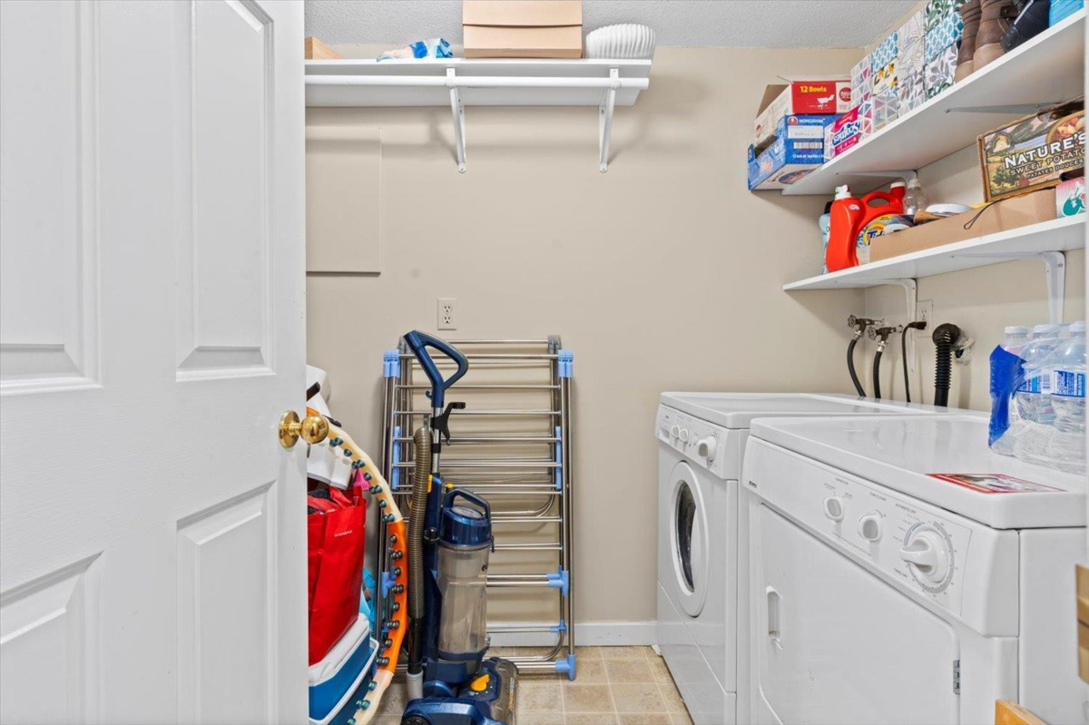 Laundry Room Photo of 114 33030 George Ferguson Way, Abbotsford, BC
