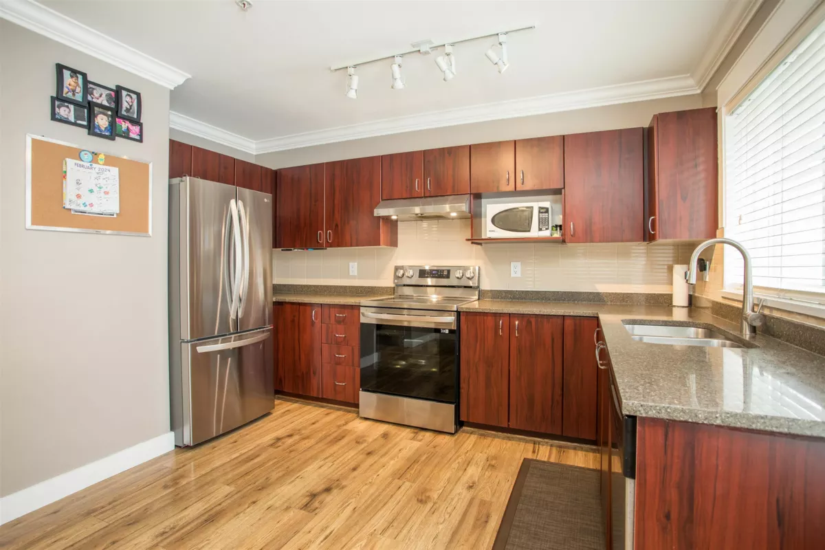 Living Room Photo of 3 8968 208 Street, Langley, BC