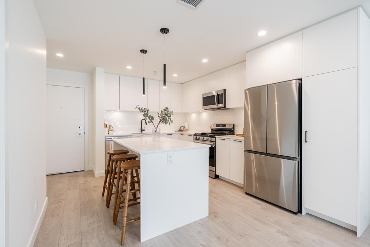 Living Room Photo of G408 8380 200a Street, Langley, BC