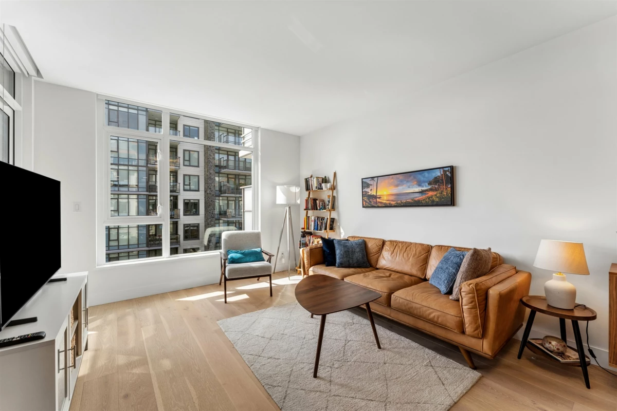 Living Room Photo of 403 2780 Valley Centre Avenue, North Vancouver, BC