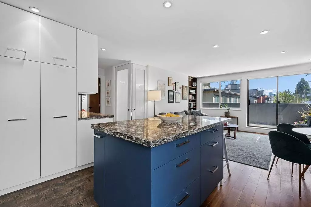 Living Room Photo of 104 1512 Yew Street, Vancouver, BC