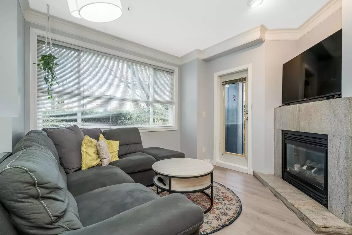 Living Room Photo of 107 8115 121a Street, Surrey, BC