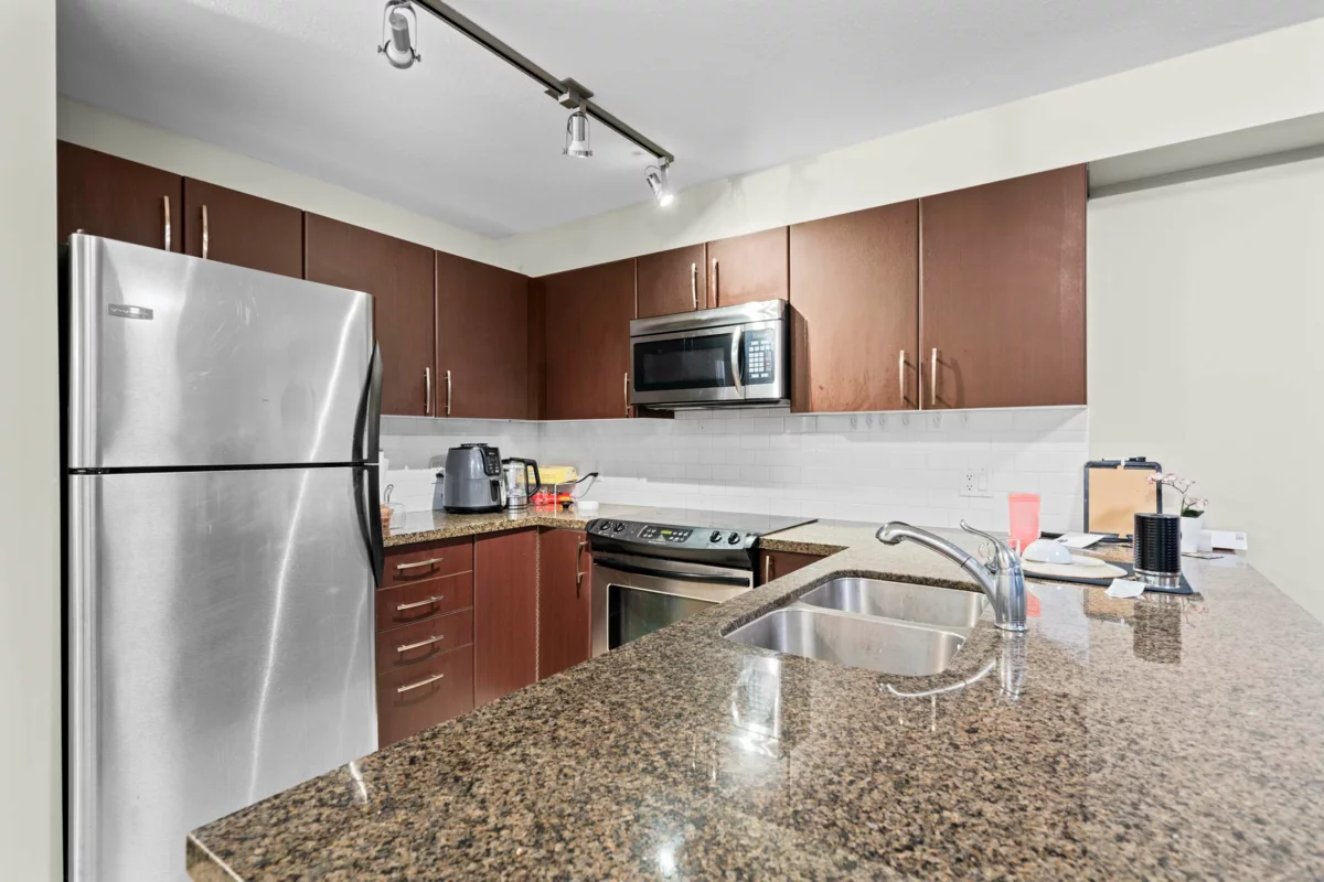 Living Room Photo of 209 7337 Macpherson Avenue, Burnaby, BC