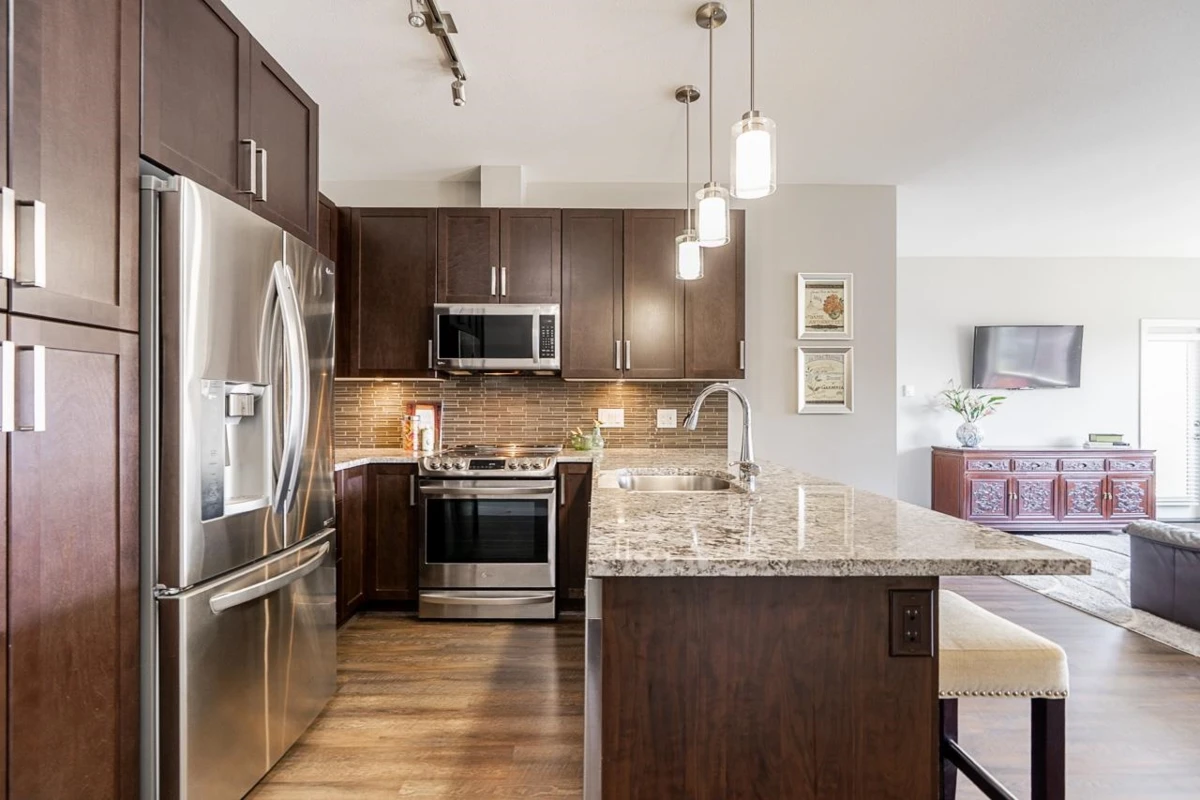 Living Room Photo of 416 6470 194 Street, Surrey, BC