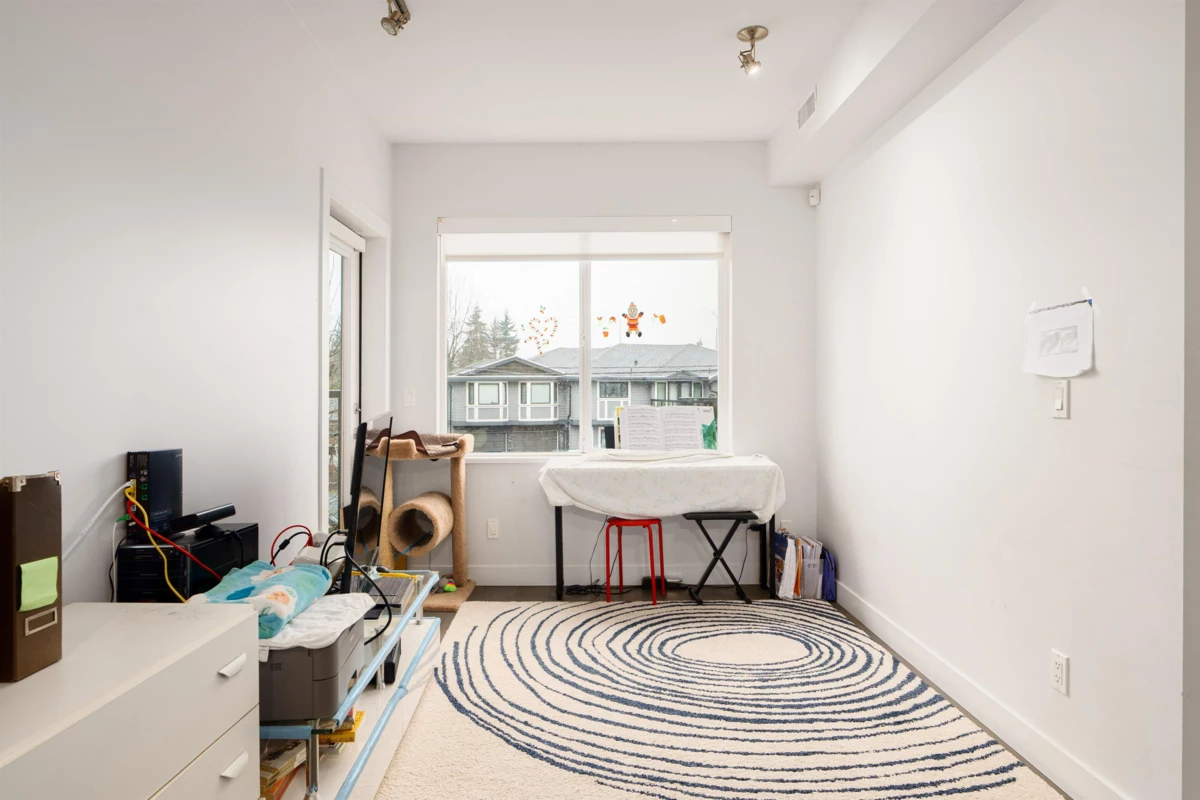 Family Room Photo of 105 10011 River Drive, Richmond, BC