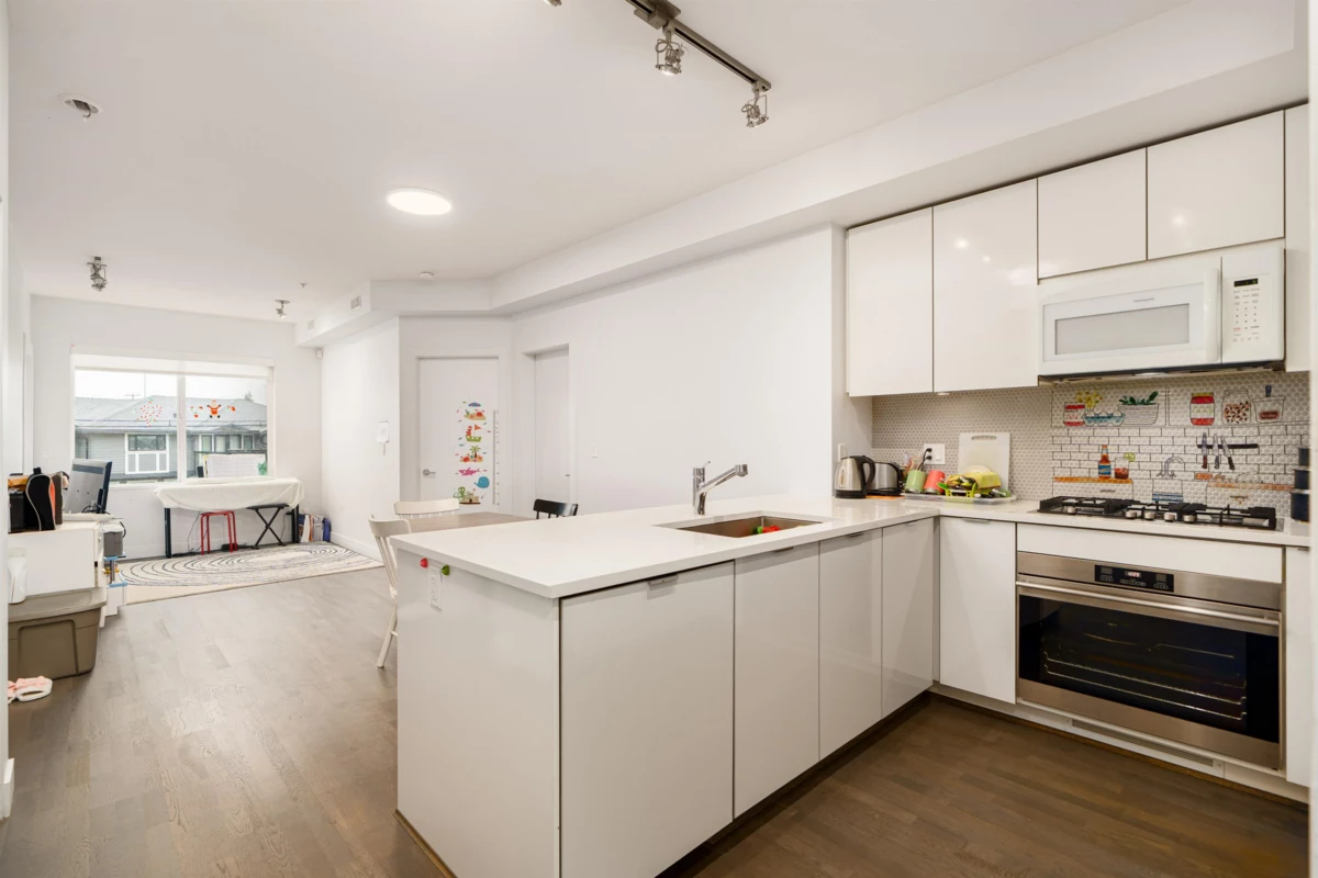 Living Room Photo of 105 10011 River Drive, Richmond, BC