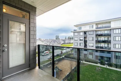 Laundry Room Photo of 402 15835 85 Avenue, Surrey, BC