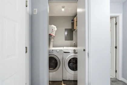 Laundry Room Photo of 204 14885 100 Avenue, Surrey, BC