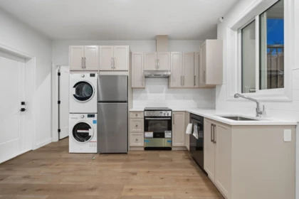 Laundry Room Photo of 102 18171 59 Avenue, Surrey, BC