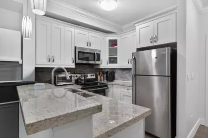 Kitchen Photo of 218 13897 Fraser Highway, Surrey, BC