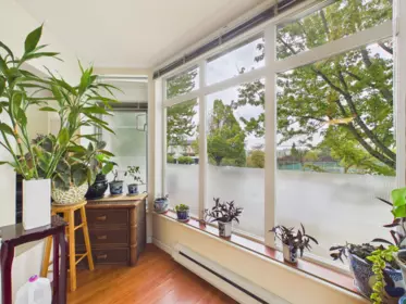 Living Room Photo of 208 2677 Broadway Street, Vancouver, BC