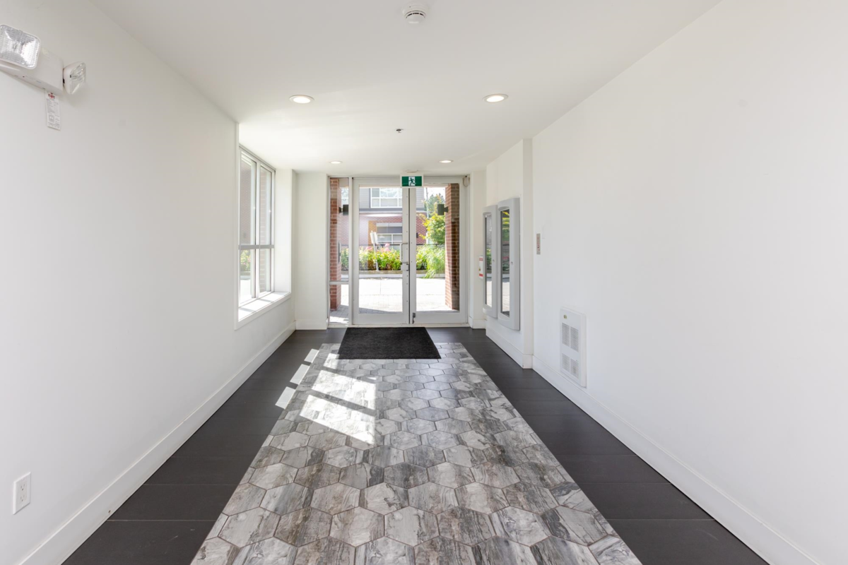 Family Room Photo of 213 6468 195a Street, Surrey, BC