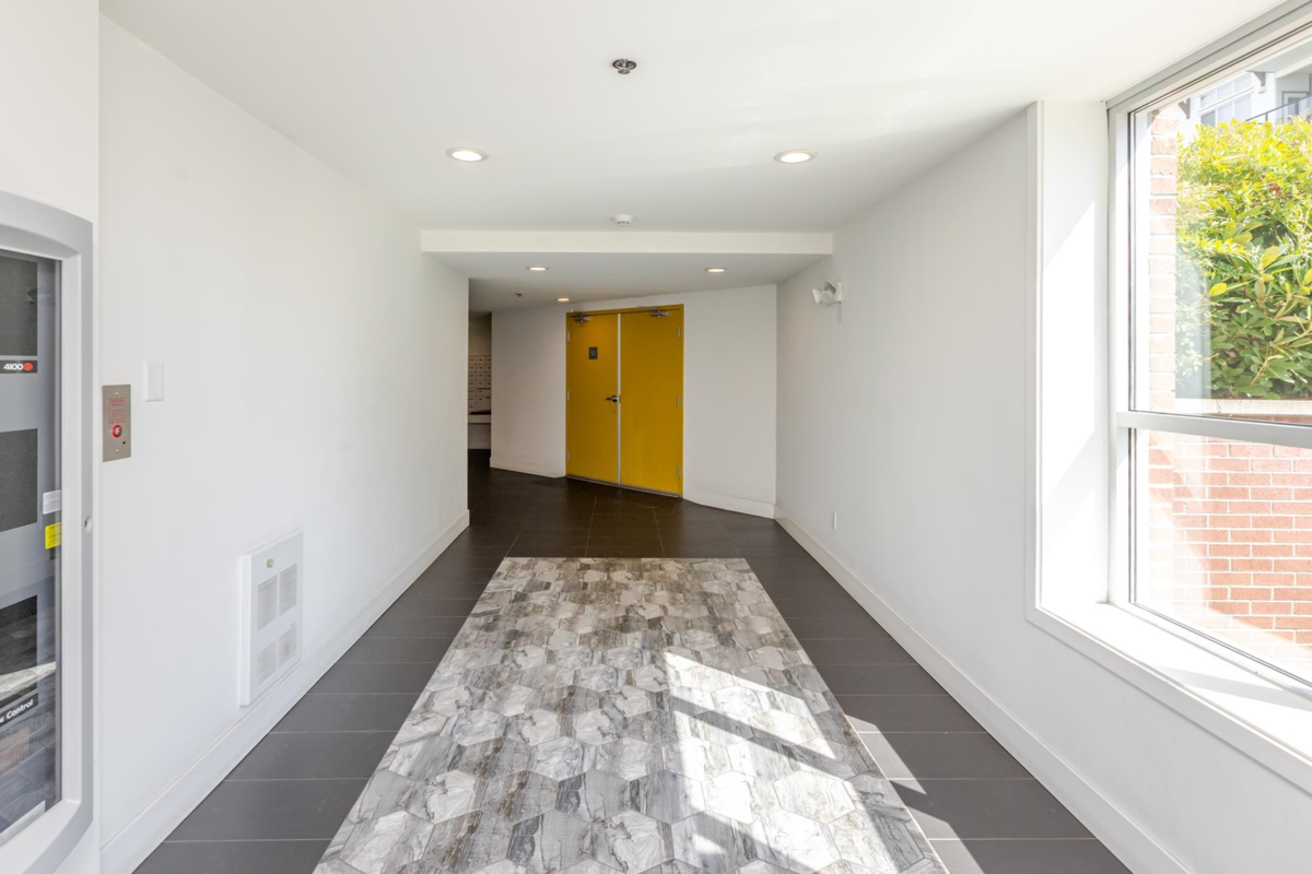 Living Room Photo of 213 6468 195a Street, Surrey, BC