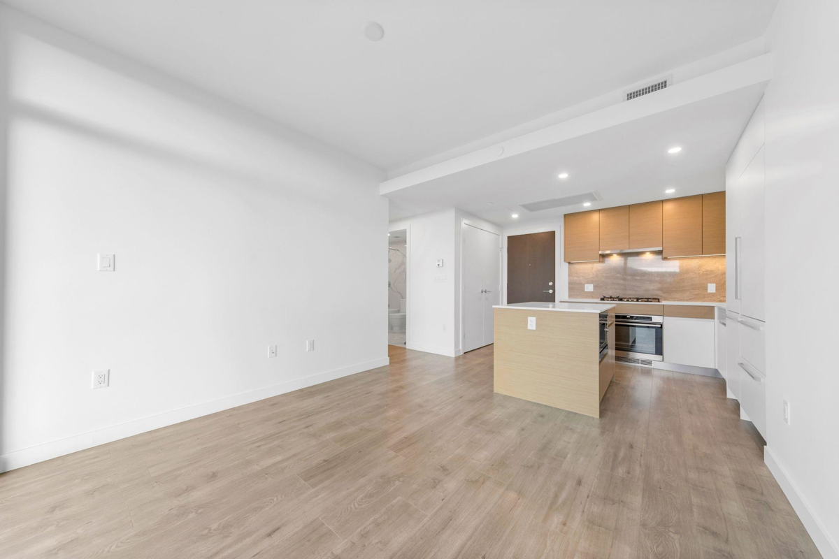 Family Room Photo of 1207 200 Klahanie Court, West Vancouver, BC