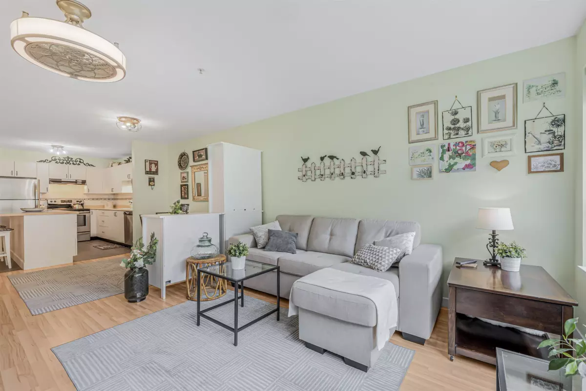 Living Room Photo of 102 9668 148 Street, Surrey, BC