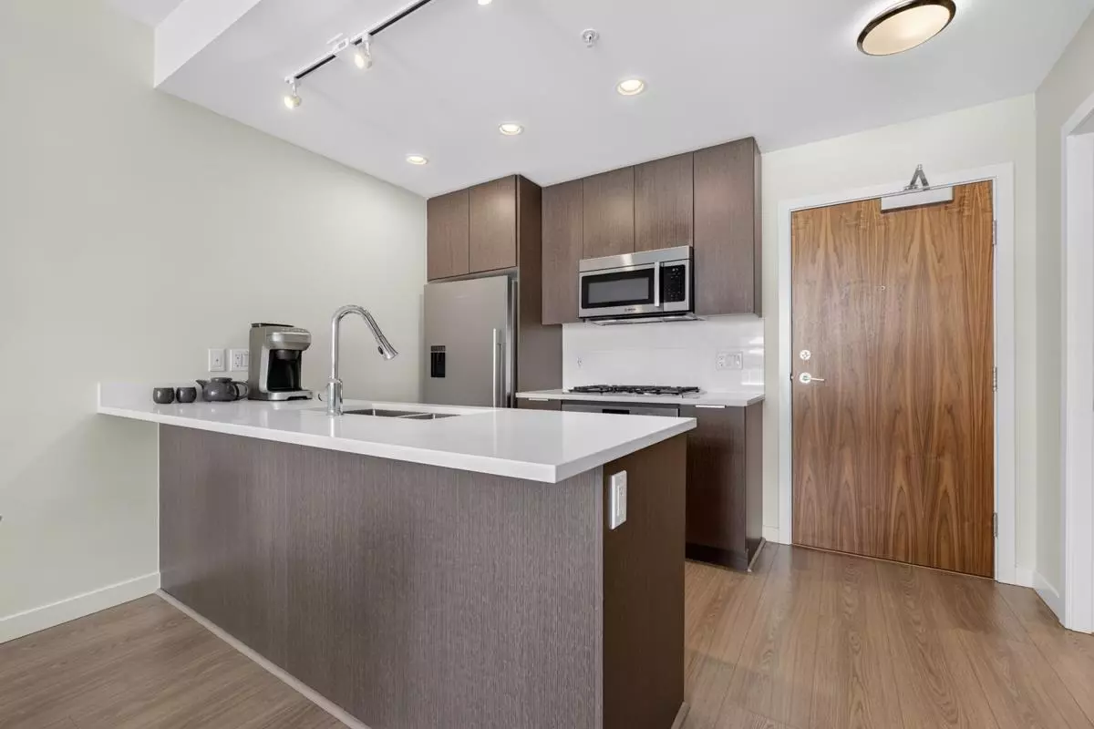 Living Room Photo of 903 8699 Hazelbridge Way, Richmond, BC