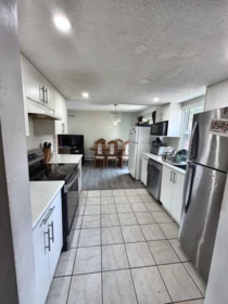 Family Room Photo of 101 7131 133a Street, Surrey, BC