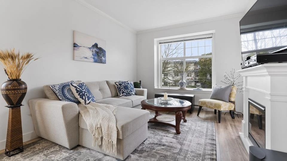Family Room Photo of 213 17712 57a Avenue, Surrey, BC
