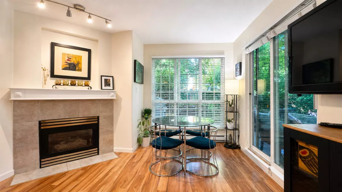 Dining Area Photo of 106 8495 Jellicoe Street, Vancouver, BC