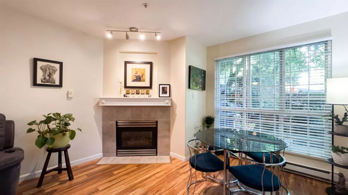 Living Room Photo of 106 8495 Jellicoe Street, Vancouver, BC