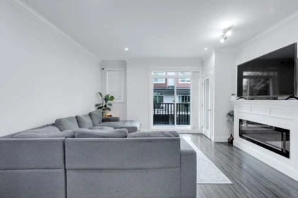 Living Room Photo of 121 13898 64 Avenue, Surrey, BC