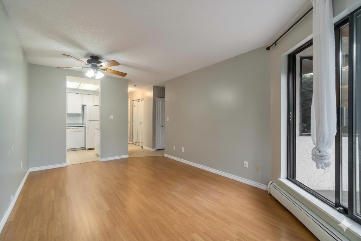 Living Room Photo of 114 1177 Howie Avenue, Coquitlam, BC