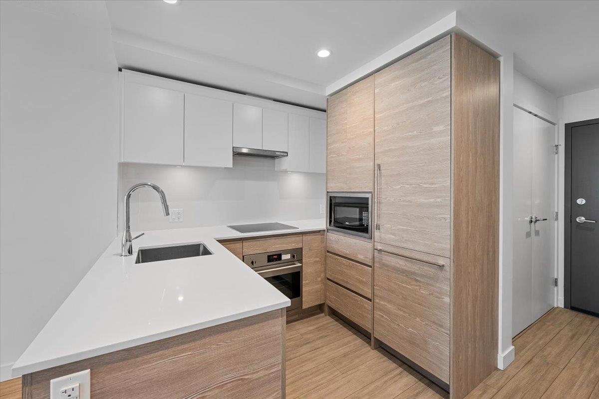 Living Room Photo of 1005 13655 Fraser Highway, Surrey, BC