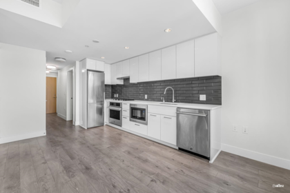 Kitchen Island Photo of 614 3451 Sawmill Crescent, Vancouver, BC