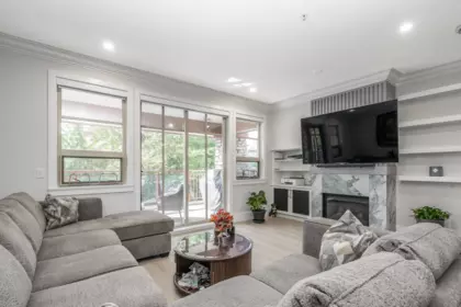 Family Room Photo of 201 16499 64 Avenue, Surrey, BC