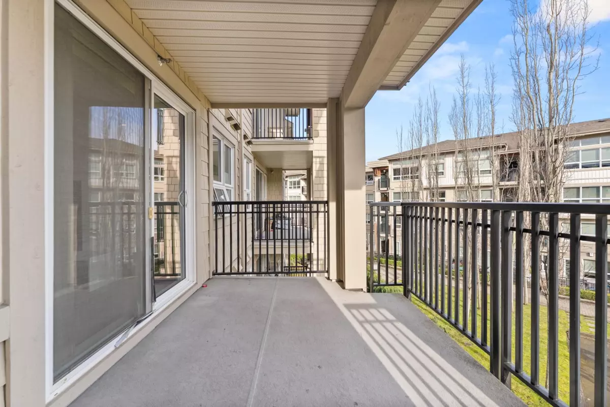 Living Room Photo of 307 6828 Eckersley Road, Richmond, BC