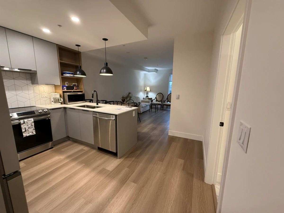 Living Room Photo of 210 10778 138 Street, Surrey, BC
