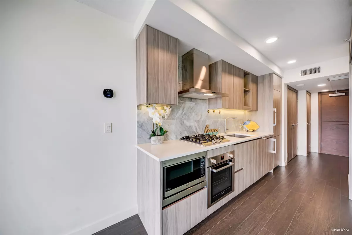 Living Room Photo of 618 8800 Hazelbridge Way, Richmond, BC