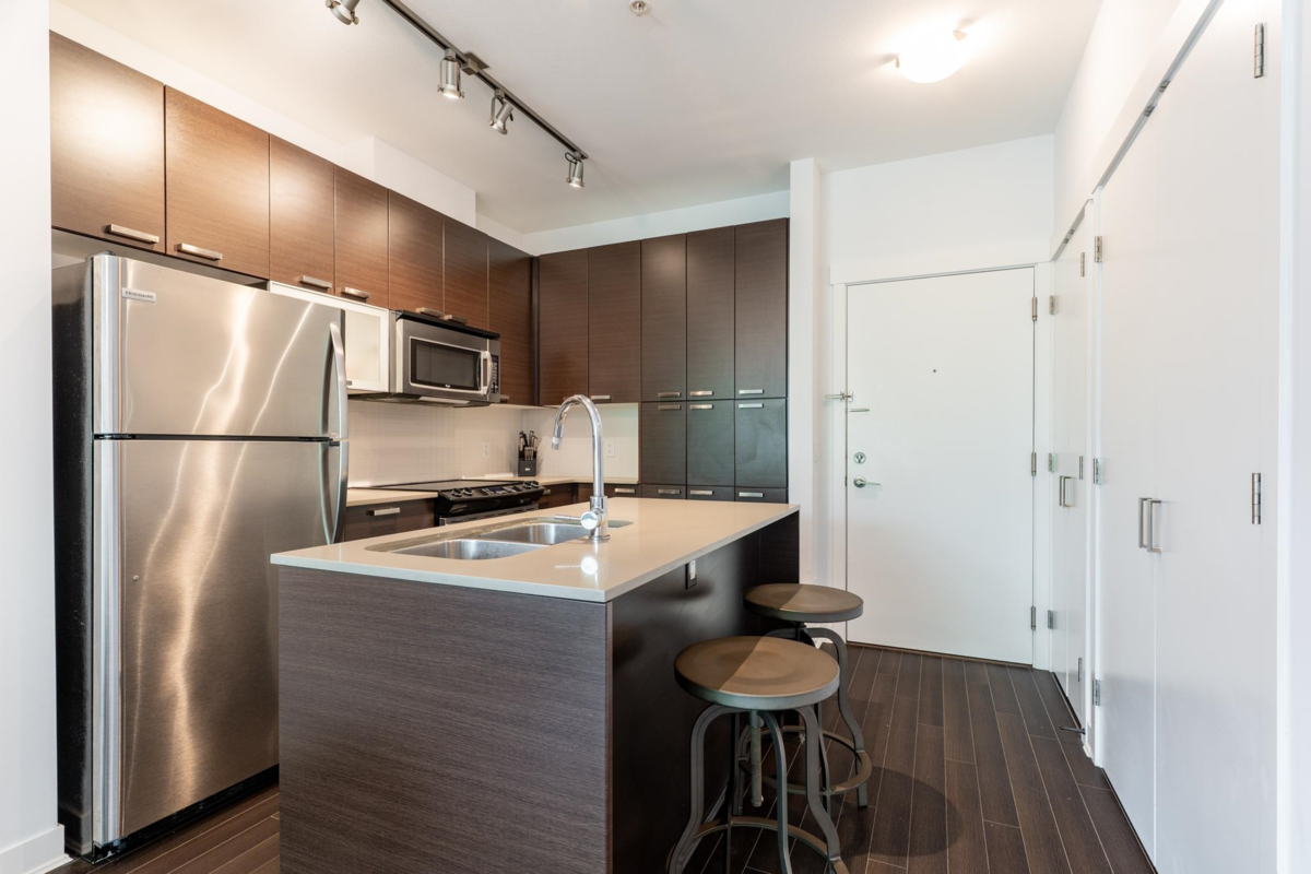 Family Room Photo of 326 18818 68 Avenue, Surrey, BC