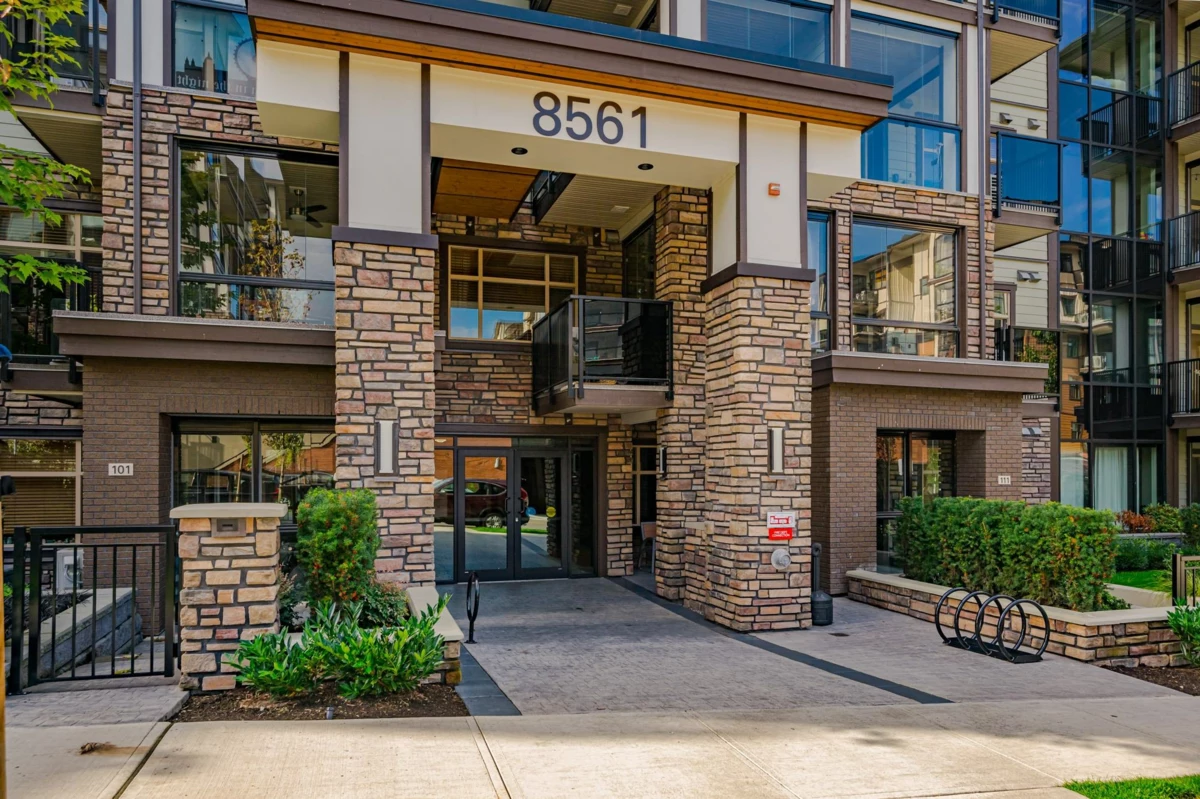 Living Room Photo of 404 8561 203a St Street, Langley, BC