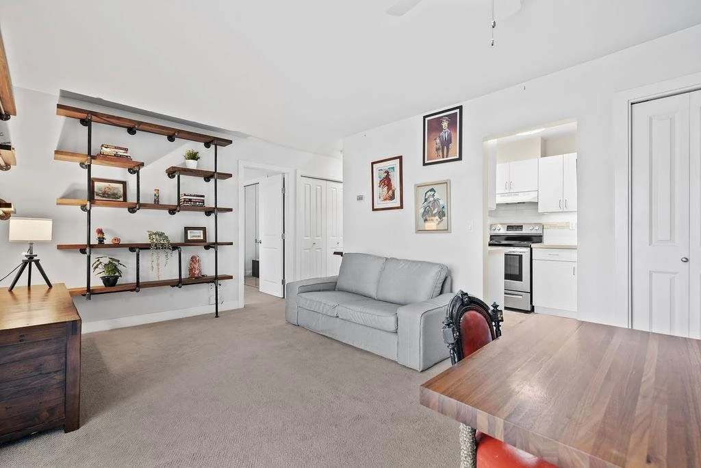 Living Room Photo of 314 711 E 6th Avenue, Vancouver, BC