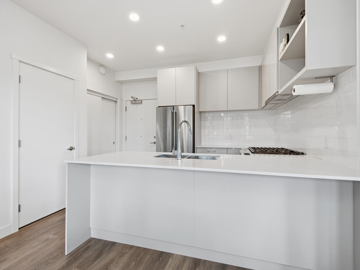 Living Room Photo of 106 741 Anskar Court, Coquitlam, BC