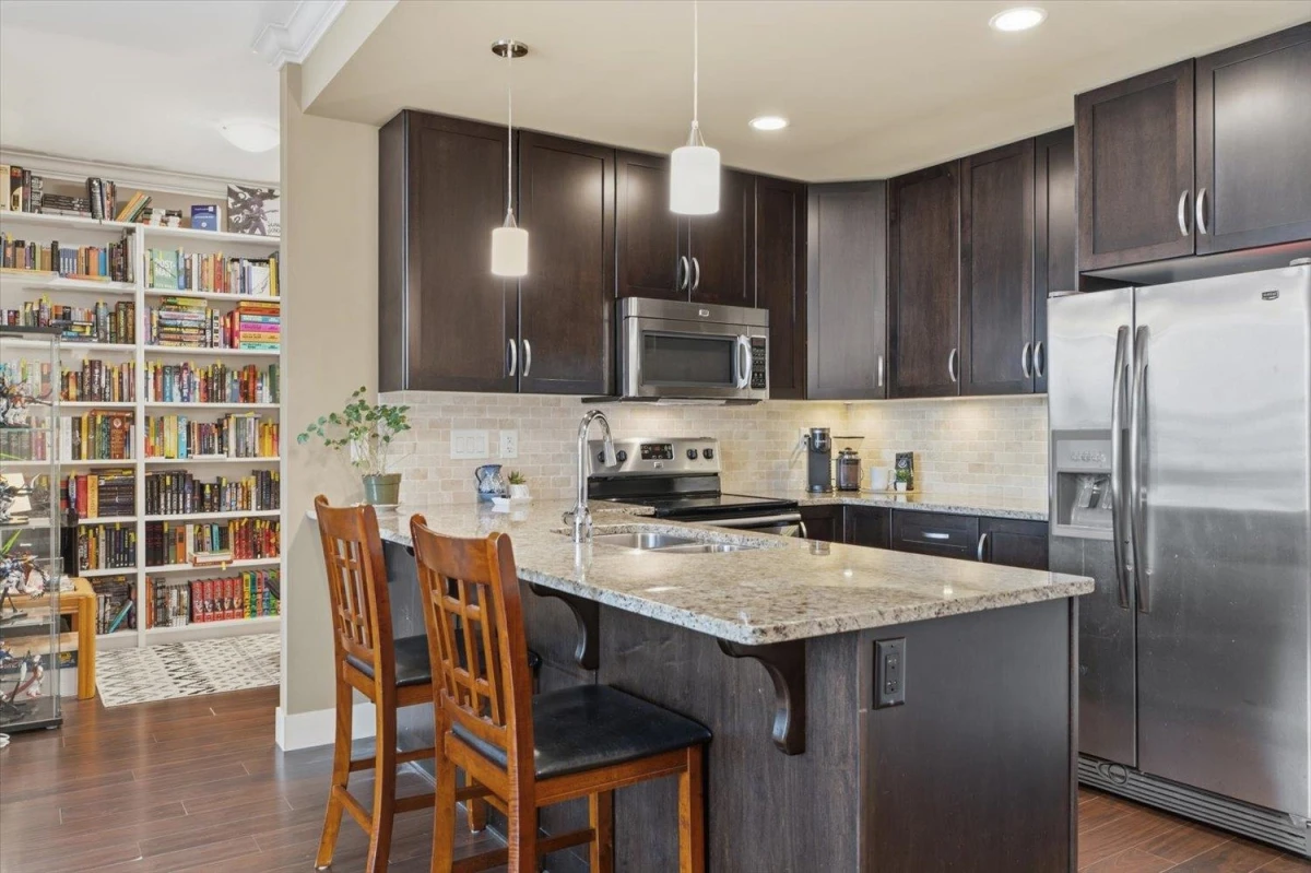 Family Room Photo of 402 3192 Gladwin Road, Abbotsford, BC