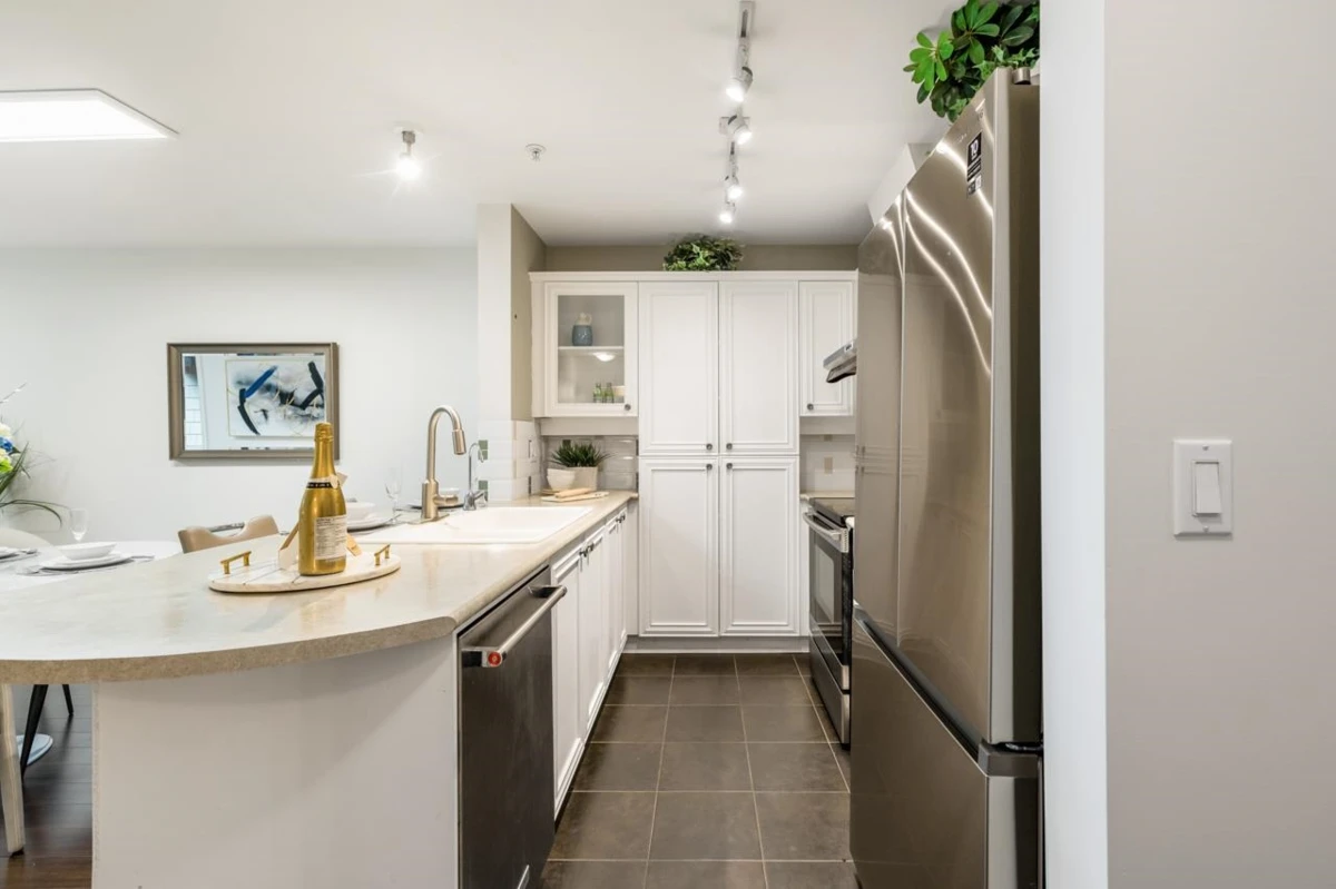 Family Room Photo of 105 988 W 54th Avenue, Vancouver, BC