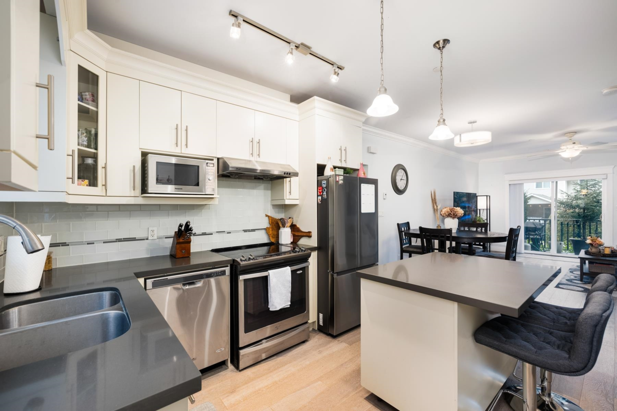 Dining Area Photo of 105 3488 Sefton Street, Port Coquitlam, BC