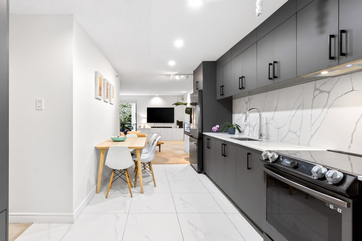 Living Room Photo of 318 1500 Pendrell Street, Vancouver, BC