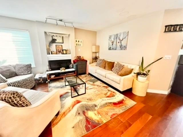 Living Room Photo of 208 13900 Hyland Road, Surrey, BC