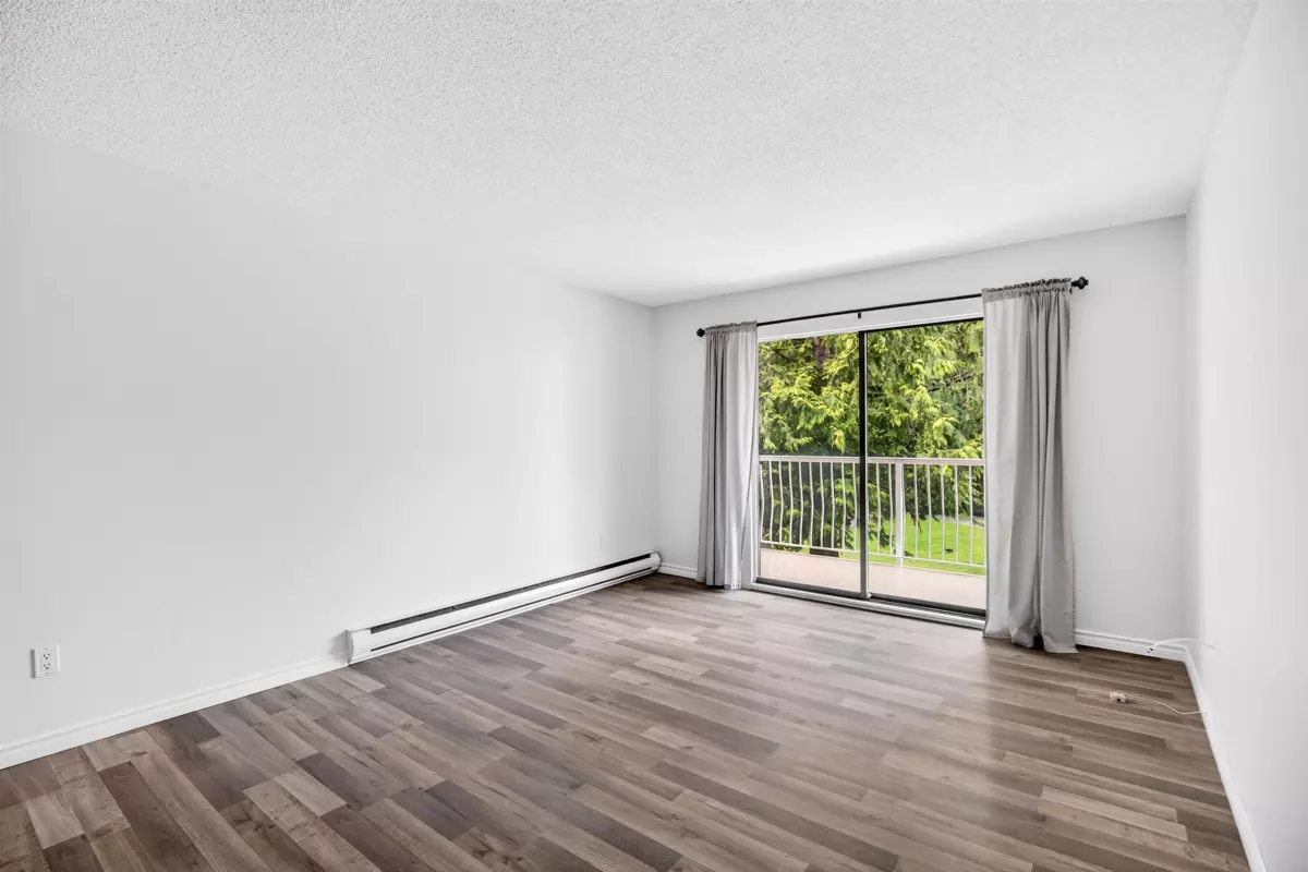 Living Room Photo of 203 12890 17 Avenue, Surrey, BC