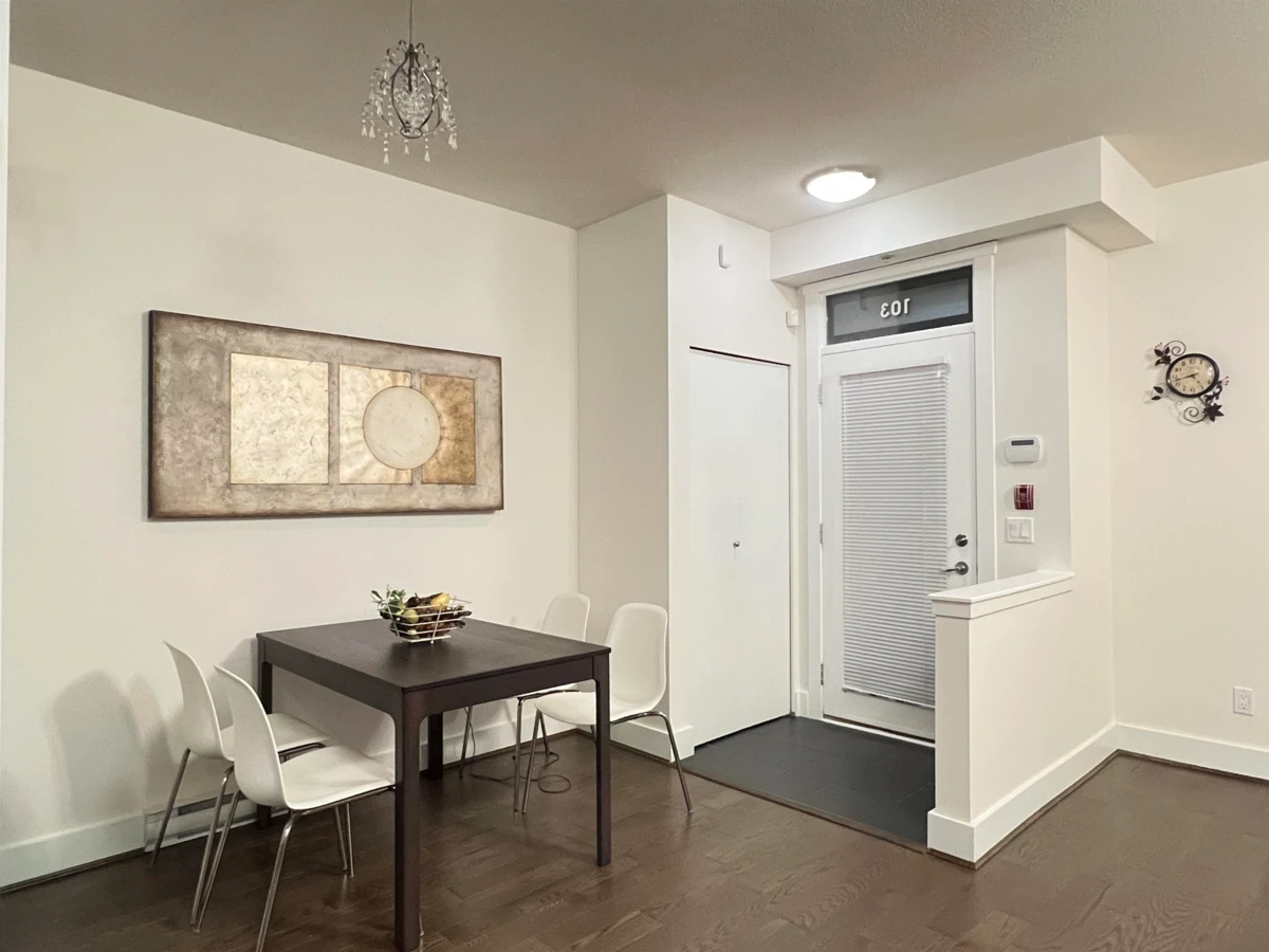 Family Room Photo of 103 7478 Byrnepark Walk, Burnaby, BC