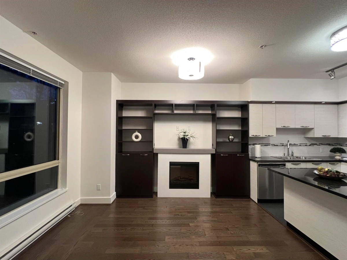 Living Room Photo of 103 7478 Byrnepark Walk, Burnaby, BC