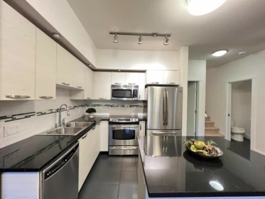 Kitchen Island Photo of 103 7478 Byrnepark Walk, Burnaby, BC