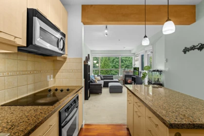 Living Room Photo of 408 560 Ravenwoods Drive, North Vancouver, BC