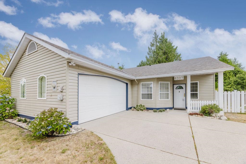 Exterior Rear Photo of 6307 Homestead Avenue, Sechelt, BC